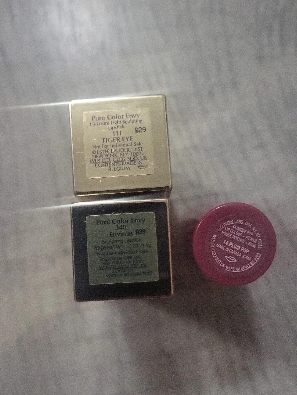 Three Lipsticks- Two Estee Lauder Pure Color Envy & One Clinique